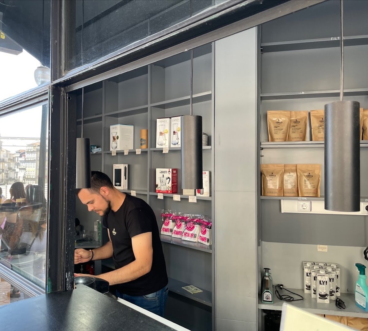 Interior of FÁBRICA COFFEE ROASTERS - TO-GO, specialty coffee shop in Porto