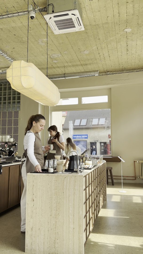 Interior of Pleiku Coffee, specialty coffee shop in Prague