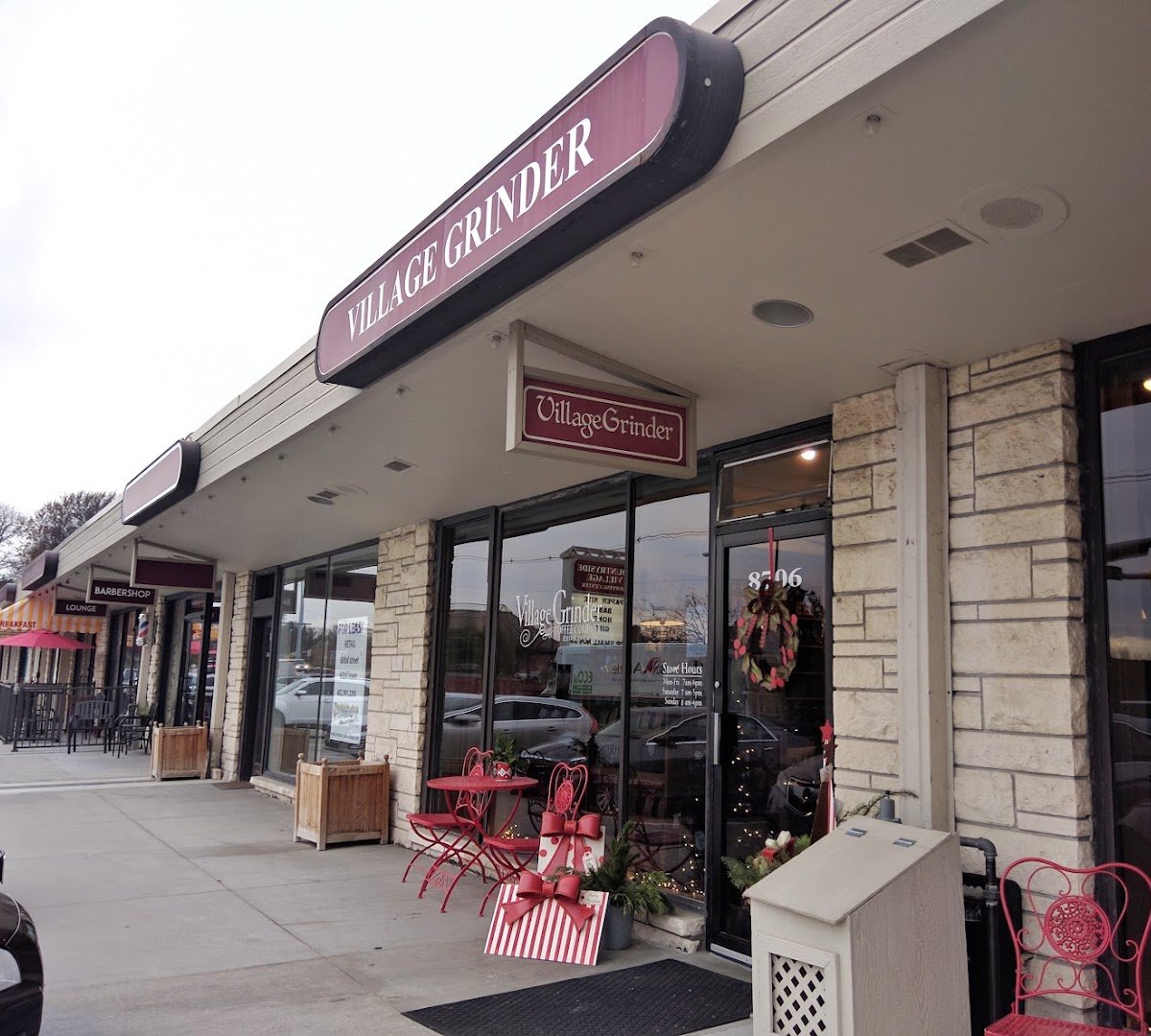Storefront of Village Grinder, specialty coffee shop in Omaha