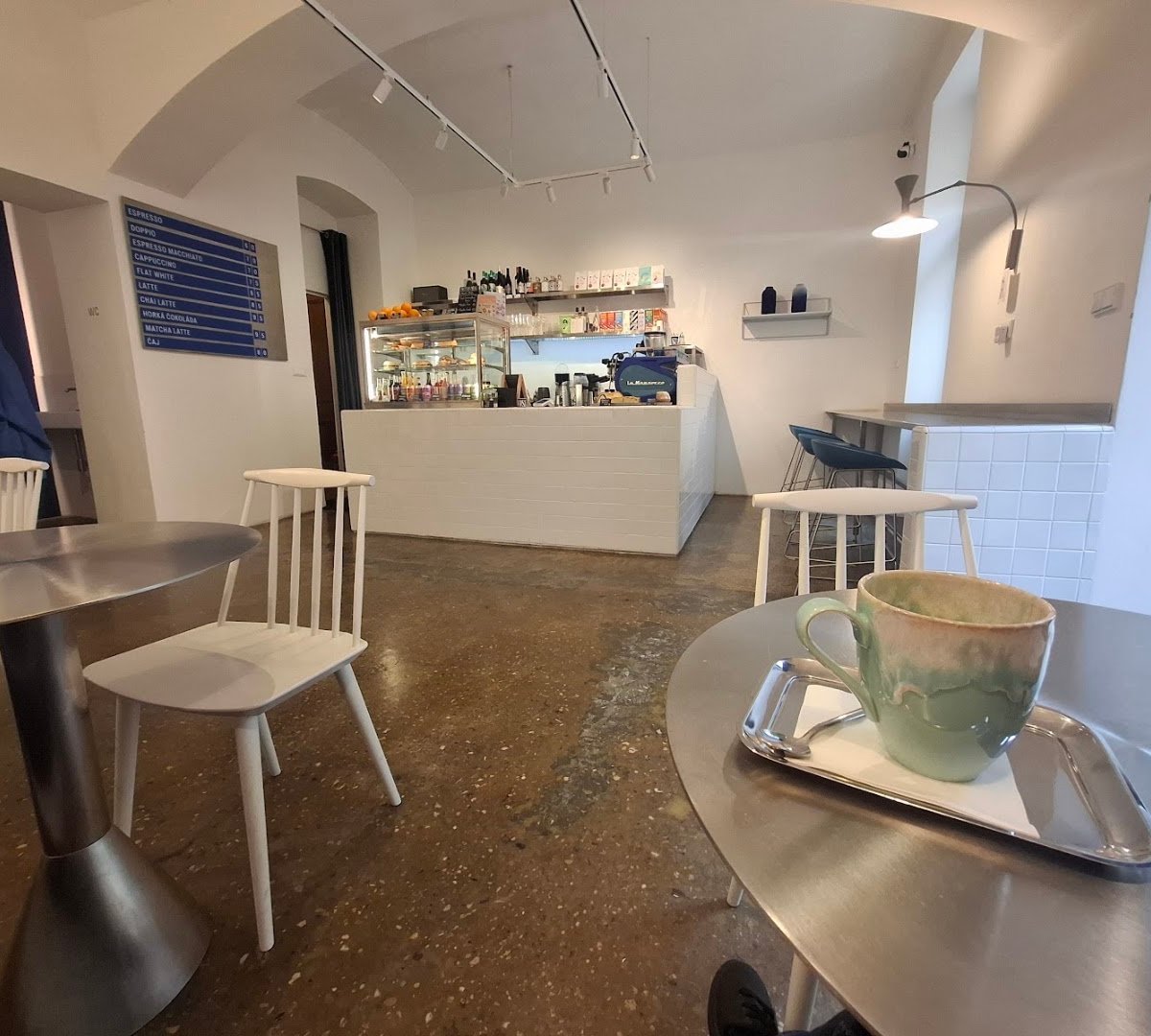 Interior of Neosly, specialty coffee shop in Prague