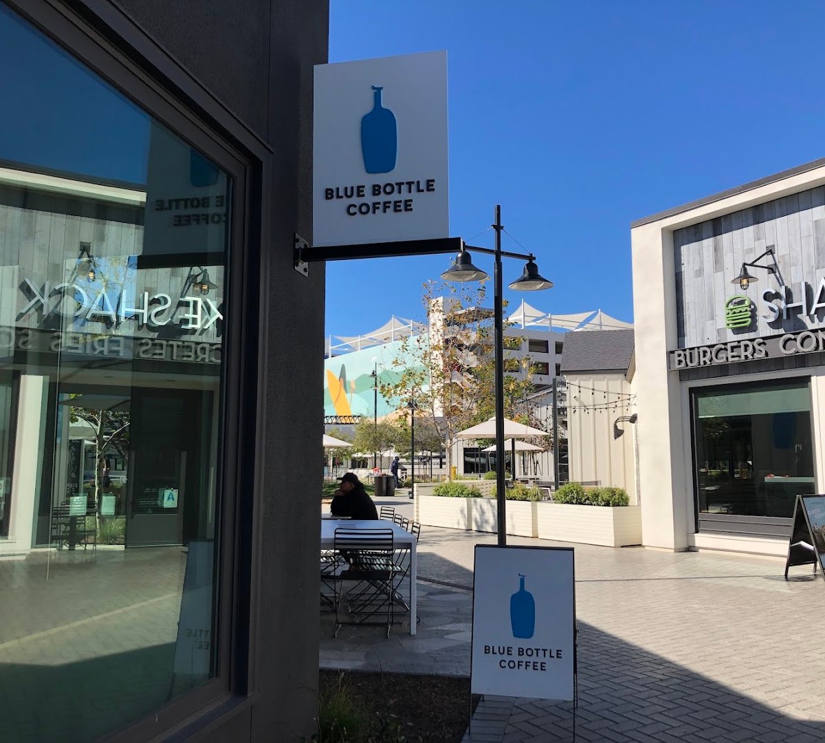 Storefront of Blue Bottle Coffee, specialty coffee shop in San Diego