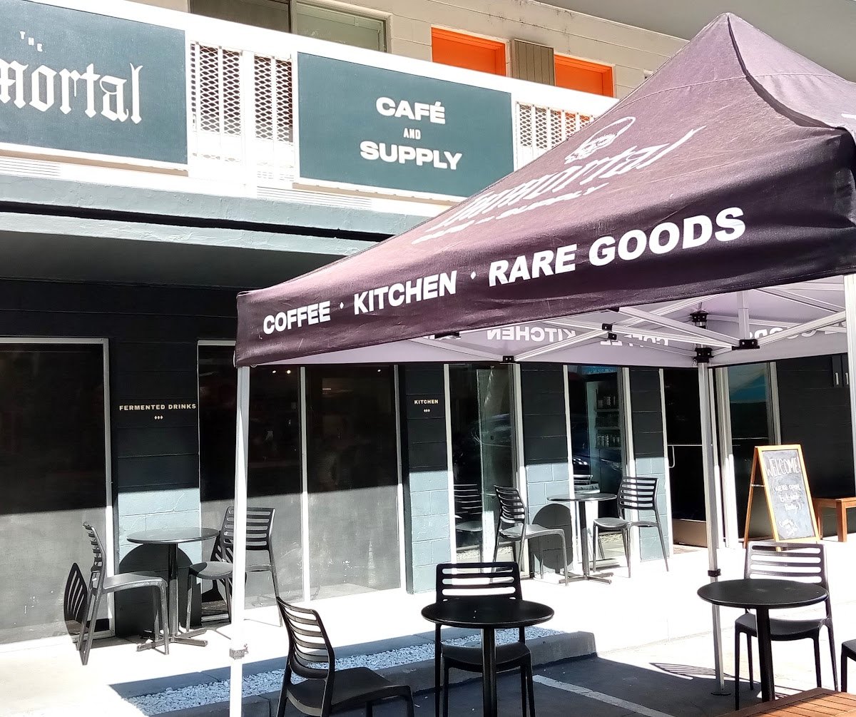 Storefront of Immortal Cafe & Supply, specialty coffee shop in Sacramento