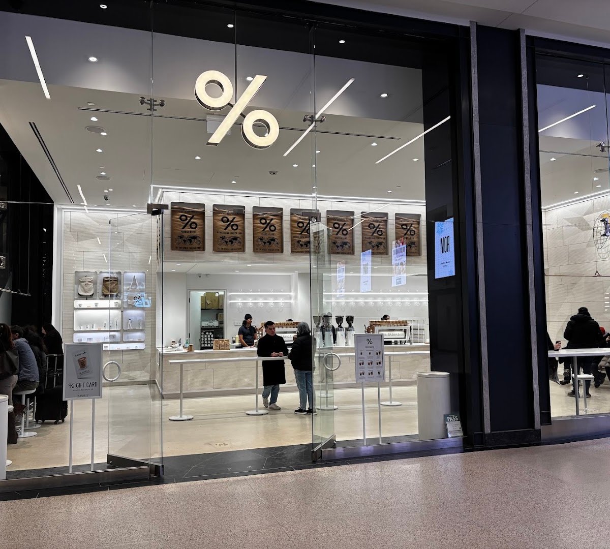 Storefront of % Arabica Toronto Union Station, specialty coffee shop in Toronto