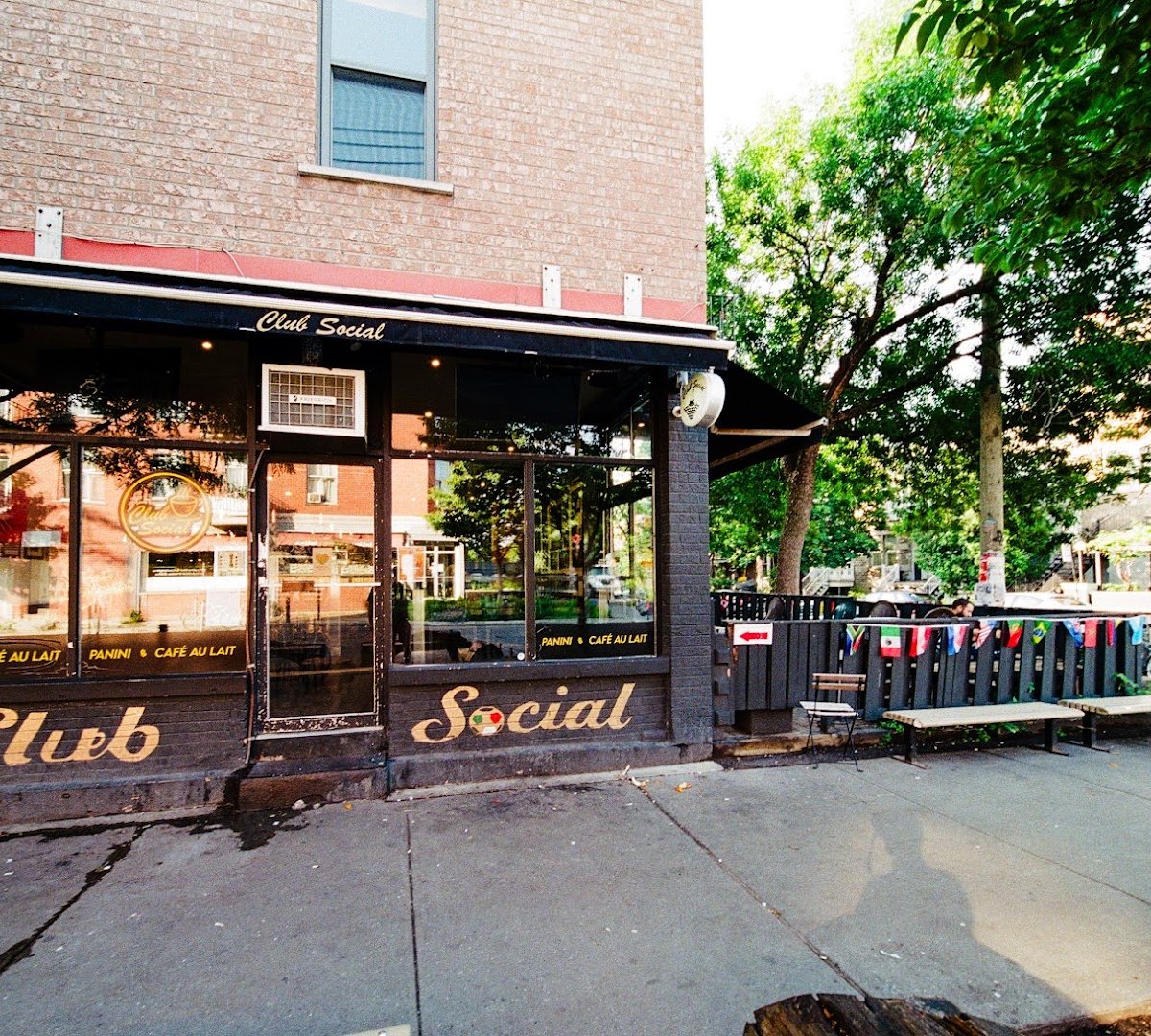 Storefront of Café Club Social, specialty coffee shop in Montreal