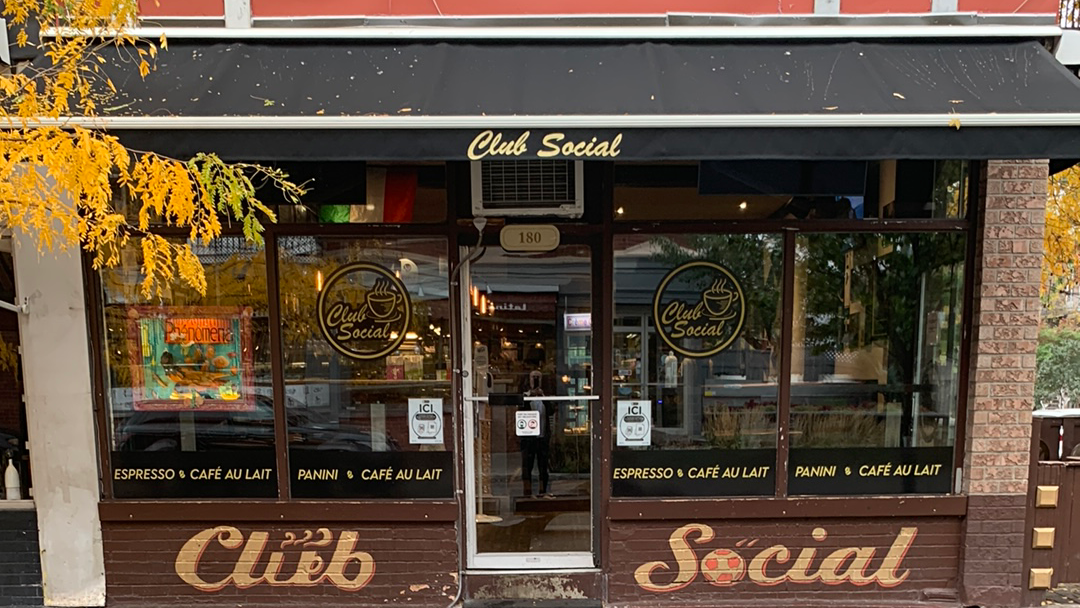 Storefront of Café Club Social, specialty coffee shop in Montreal