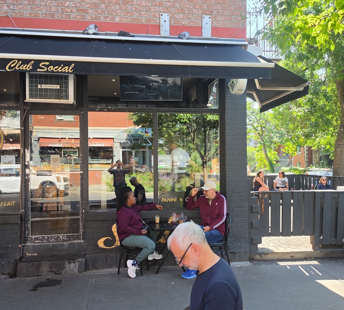 Storefront of Café Club Social, specialty coffee shop in Montreal