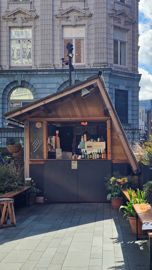 Storefront of Pulp Coffee., specialty coffee shop in Manchester