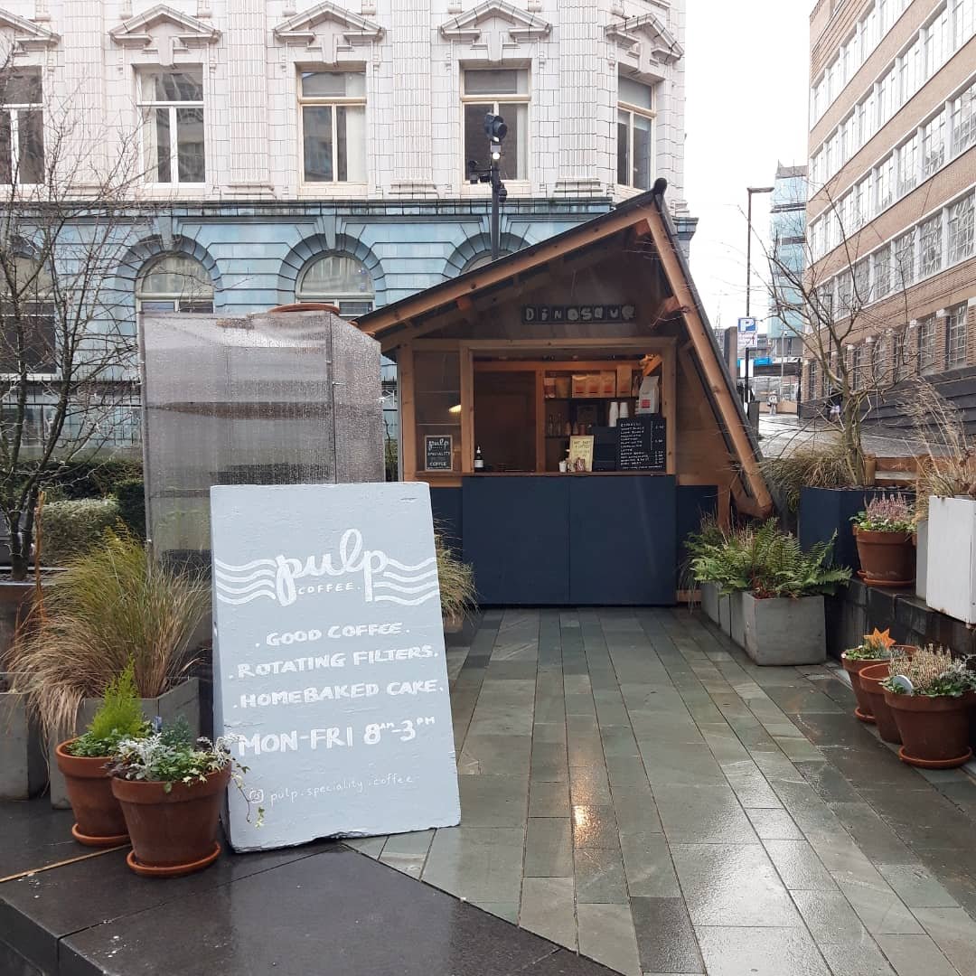 Storefront of Pulp Coffee., specialty coffee shop in Manchester