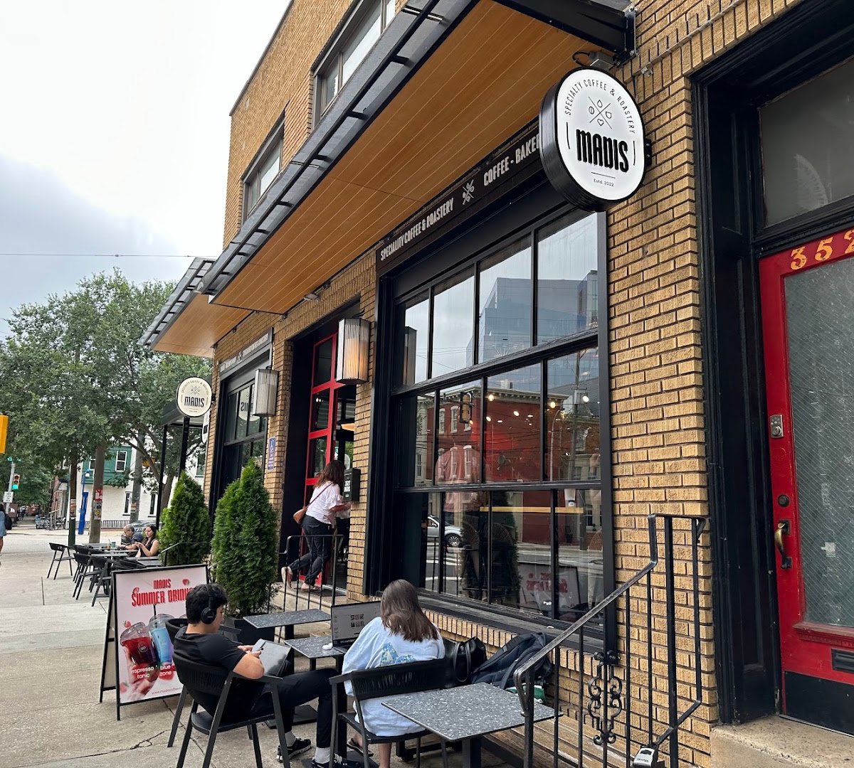 Storefront of Madis Coffee Roasters, specialty coffee shop in Philadelphia