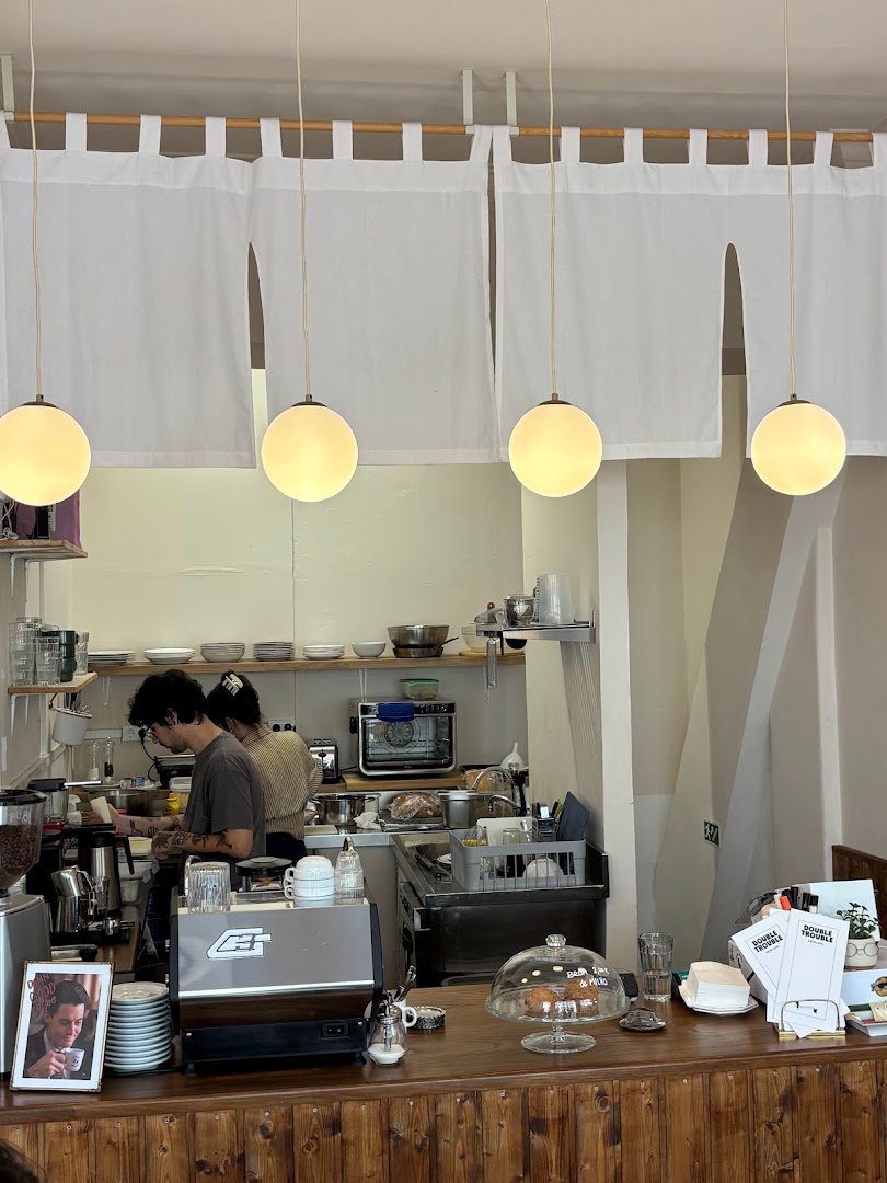Interior of Double Trouble Specialty Coffee Campo de Ourique, specialty coffee shop in Lisbon