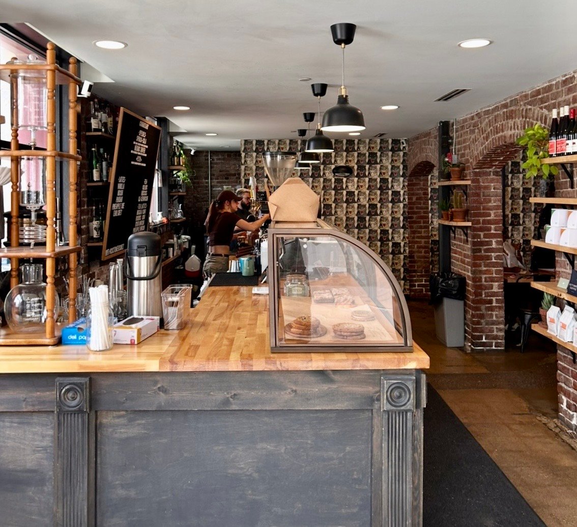 Interior of Commissary Barber & Barista, specialty coffee shop in Indianapolis