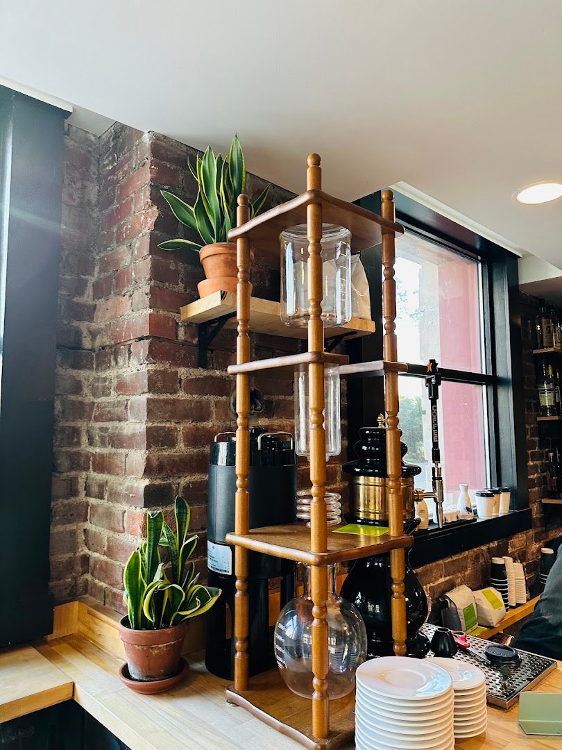 Interior of Commissary Barber & Barista, specialty coffee shop in Indianapolis