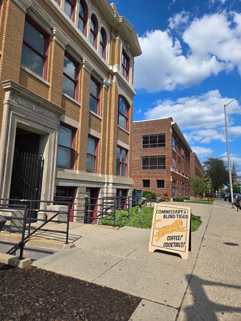 Storefront of Commissary Barber & Barista, specialty coffee shop in Indianapolis