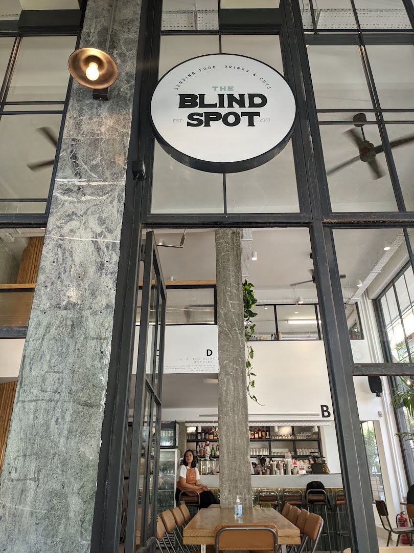 Storefront of The Blind Spot Pangrati, specialty coffee shop in Athens