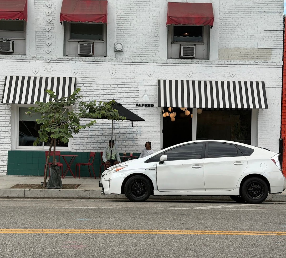 Storefront of Alfred Coffee, specialty coffee shop in Los Angeles