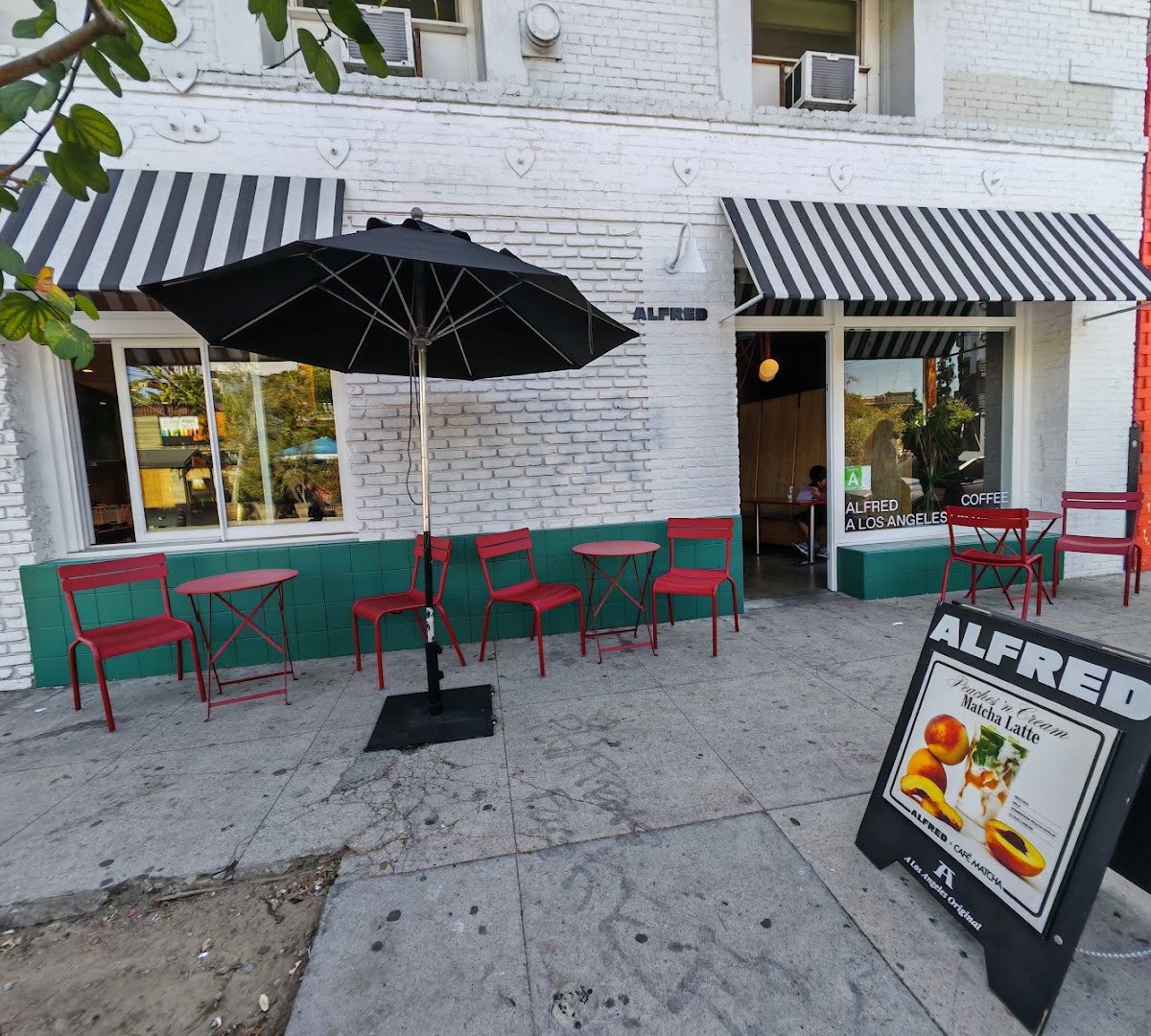 Storefront of Alfred Coffee, specialty coffee shop in Los Angeles