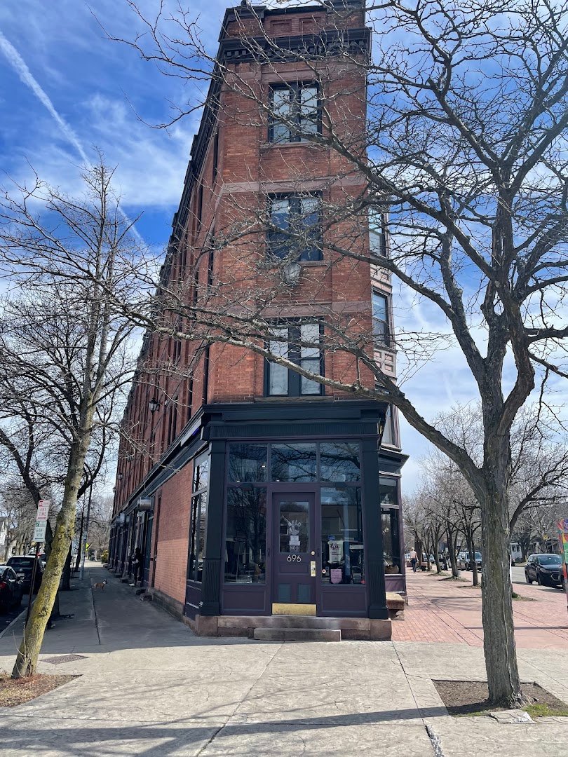 Storefront of Melo Coffee & Kitchen, specialty coffee shop in Rochester