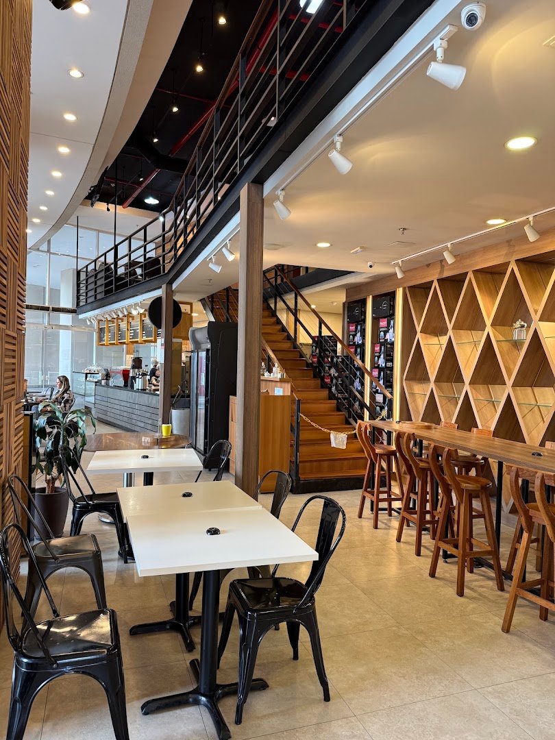 Interior of Um Coffee Co., specialty coffee shop in São Paulo