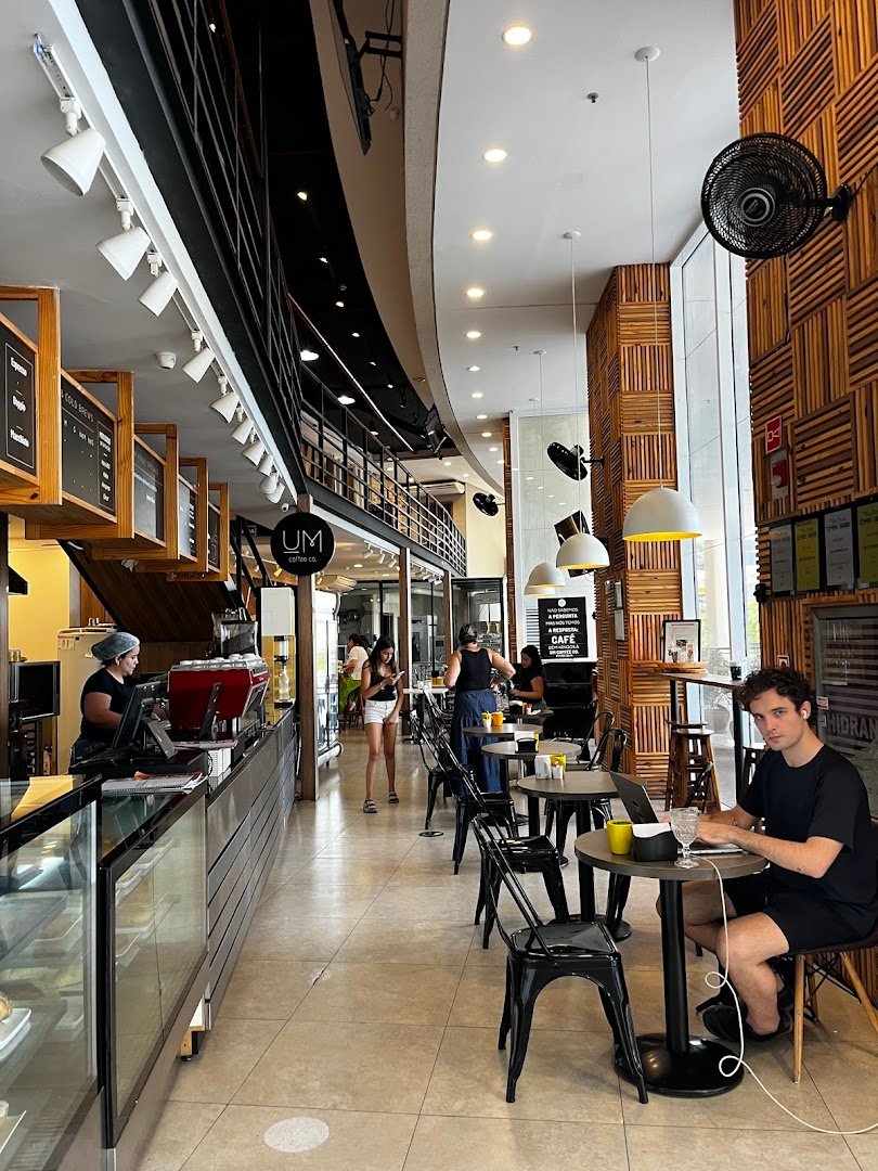 Interior of Um Coffee Co., specialty coffee shop in São Paulo