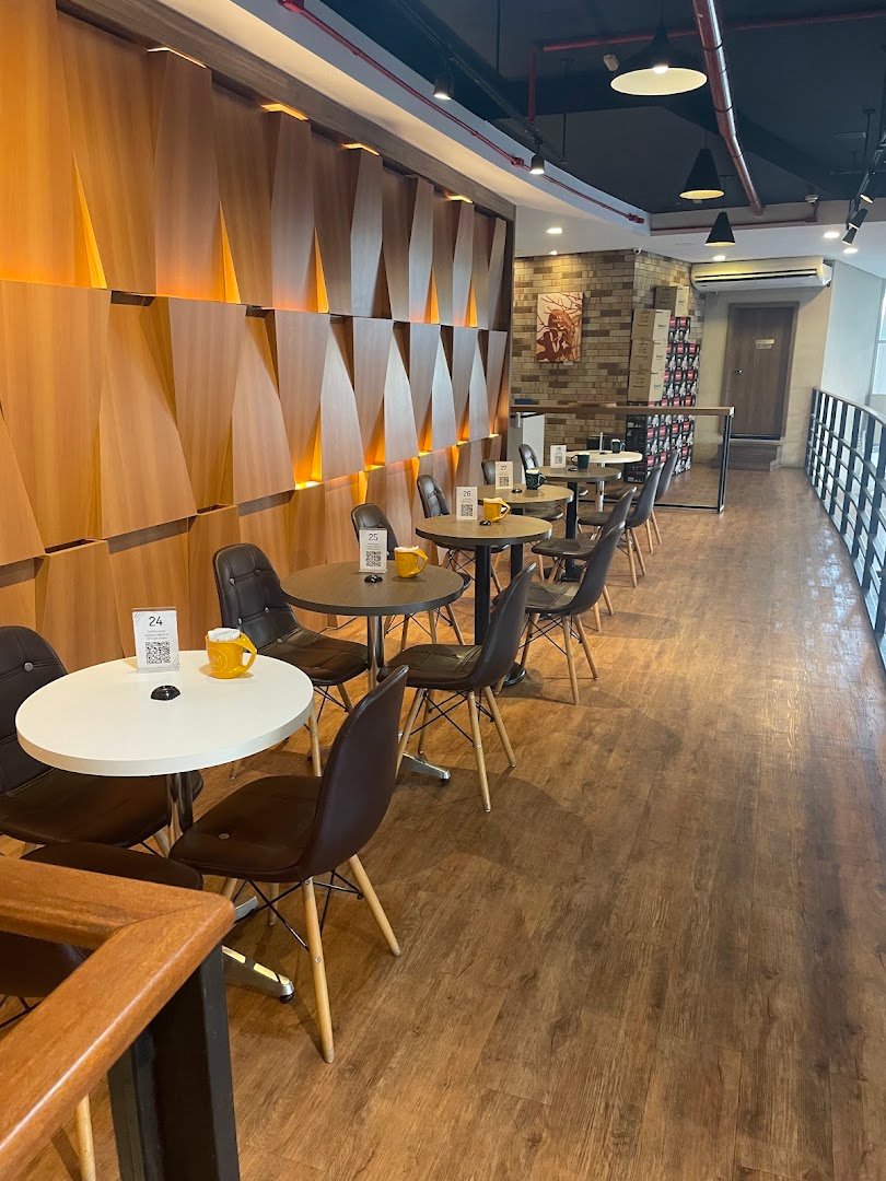 Interior of Um Coffee Co., specialty coffee shop in São Paulo