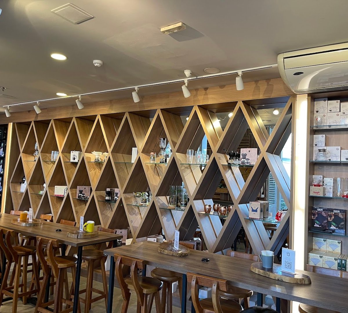 Interior of Um Coffee Co., specialty coffee shop in São Paulo