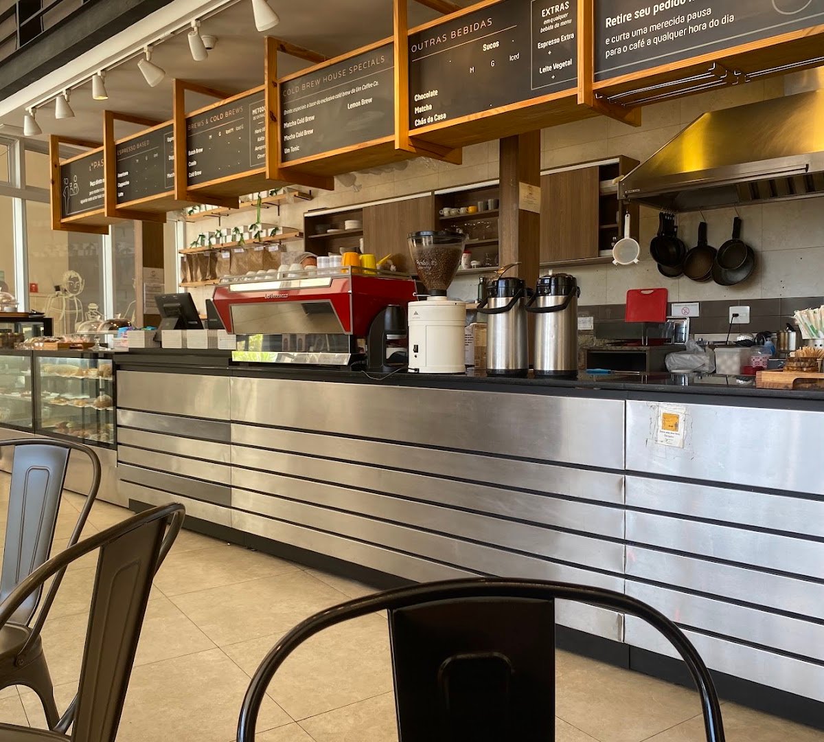 Interior of Um Coffee Co., specialty coffee shop in São Paulo