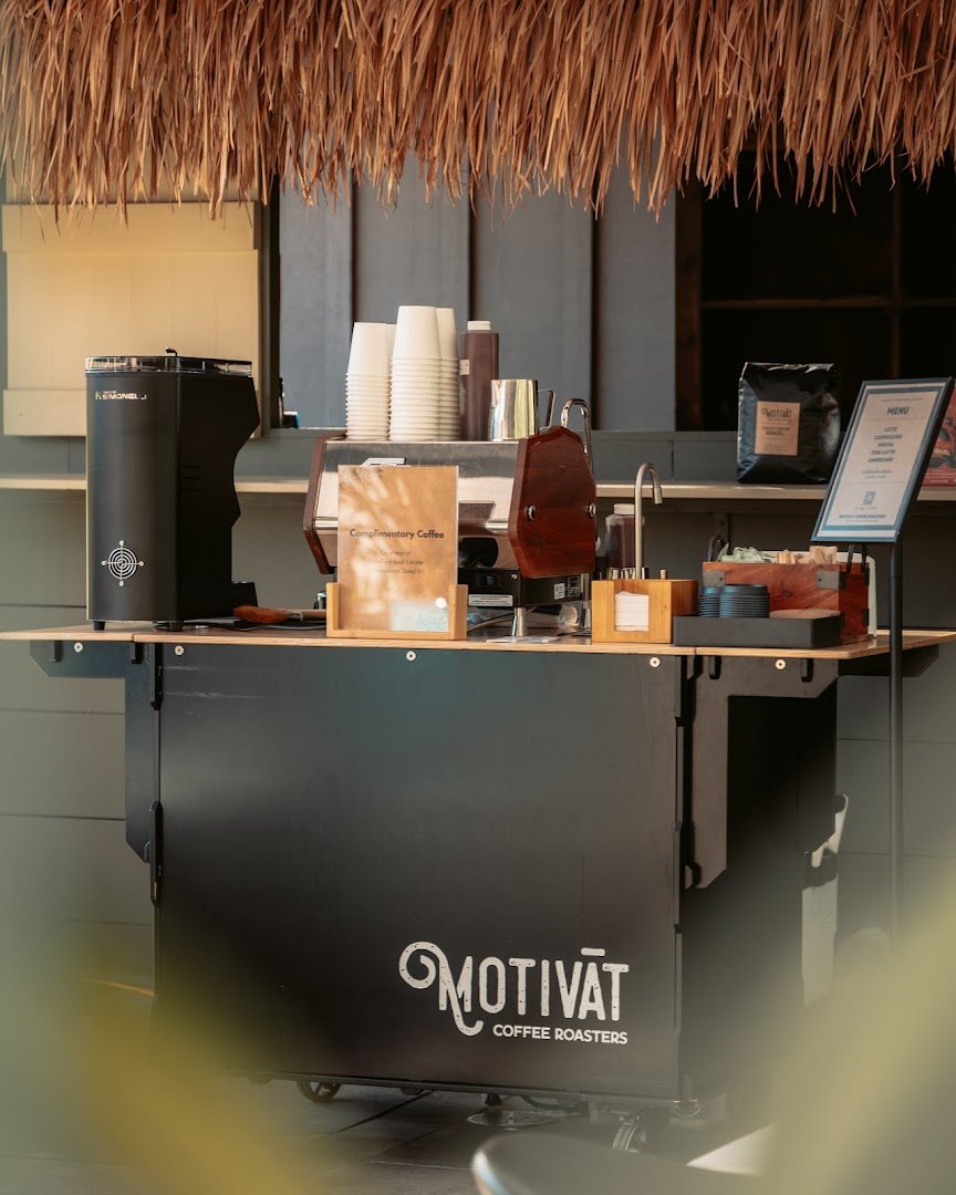 Storefront of Motivāt Coffee Roasters, specialty coffee shop in Oakland