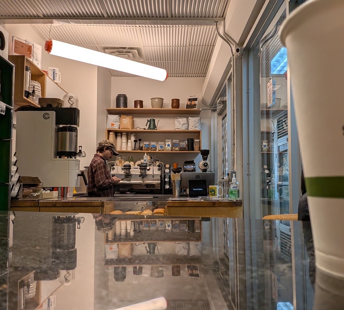 Interior of Secret Coffee, specialty coffee shop in New York