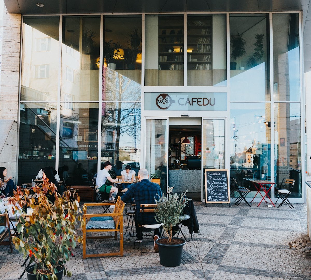 Storefront of Cafedu, specialty coffee shop in Prague