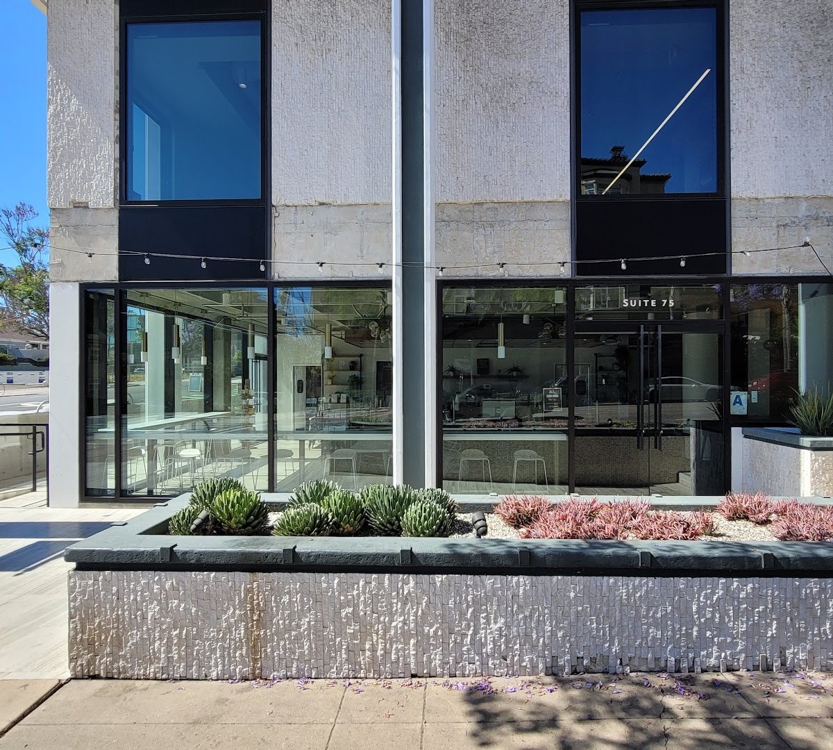Storefront of Talitha Coffee Roasters, specialty coffee shop in San Diego