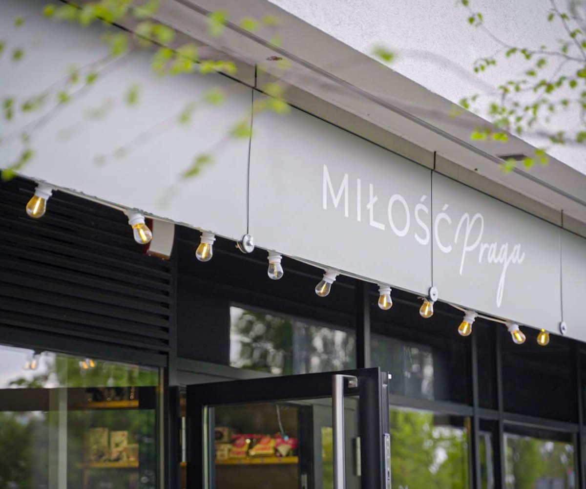 Signage at MIŁOŚĆ, specialty coffee shop in Warsaw
