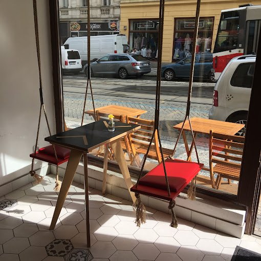 Interior of Dos Mundos Café, specialty coffee shop in Prague