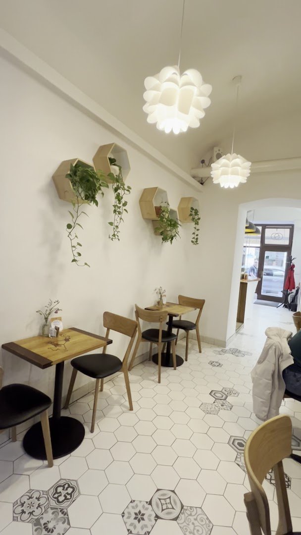Interior of Dos Mundos Café, specialty coffee shop in Prague