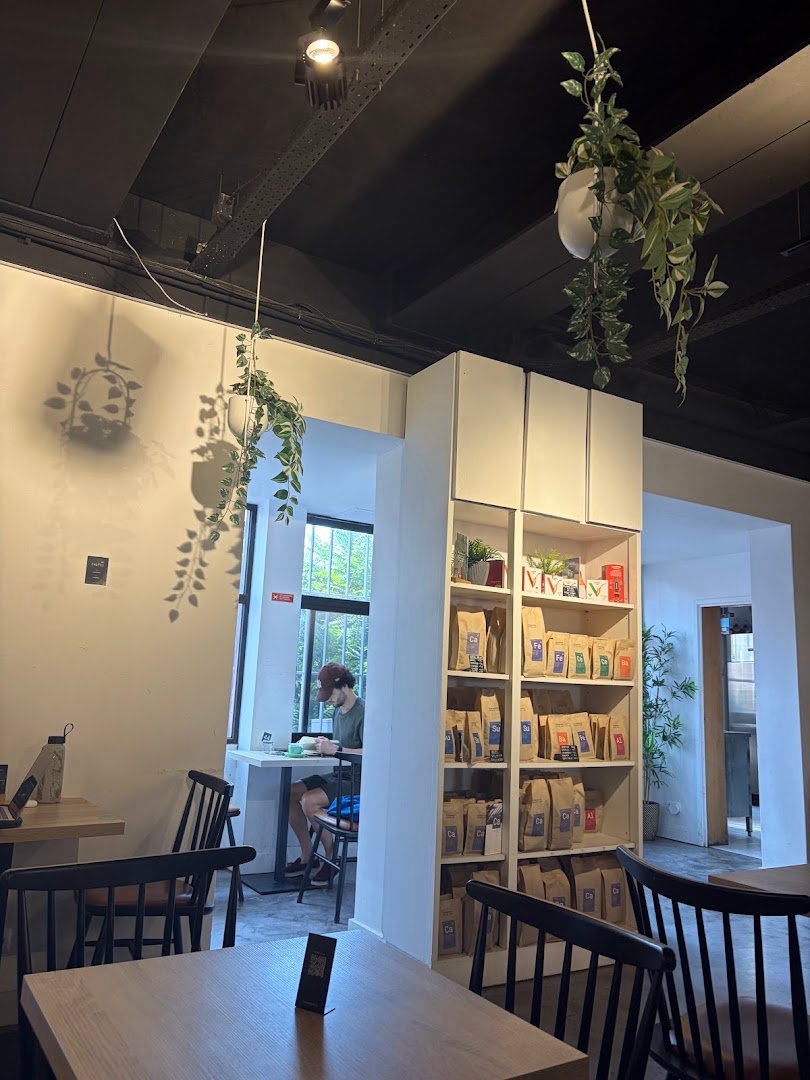 Interior of Copenhagen Coffee Lab, specialty coffee shop in Lisbon