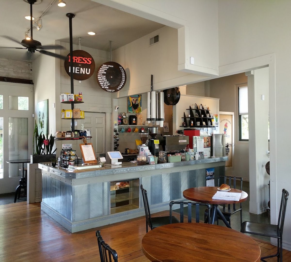 Interior of PRESS Coffee @ The Boardwalk, specialty coffee shop in San Antonio