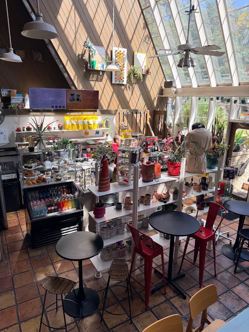 Interior of PRESS Coffee @ The Boardwalk, specialty coffee shop in San Antonio