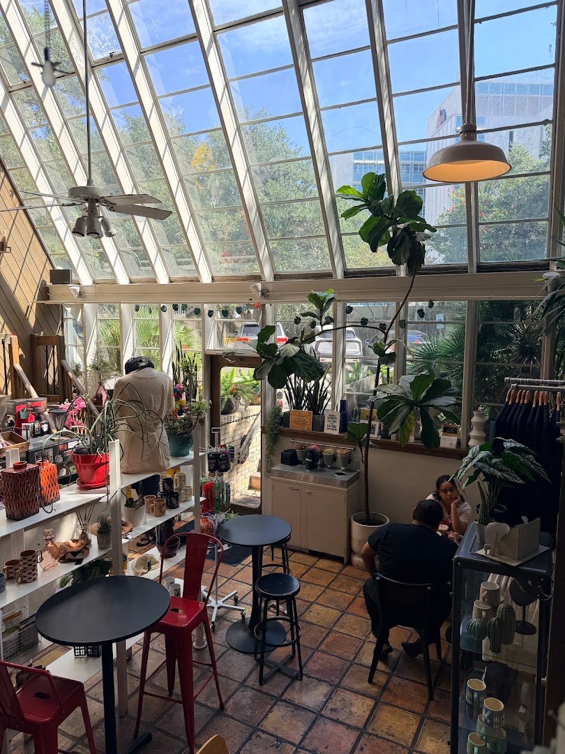 Interior of PRESS Coffee @ The Boardwalk, specialty coffee shop in San Antonio