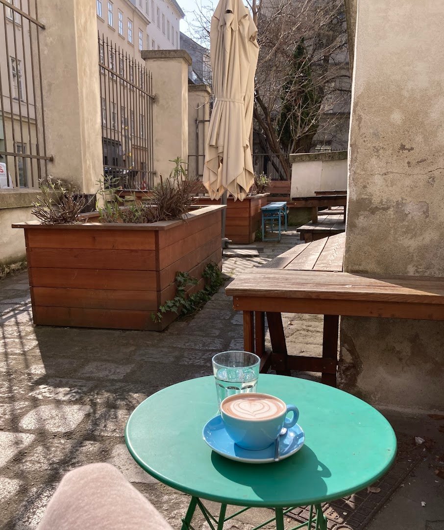 Storefront of People on Caffeine, specialty coffee shop in Vienna