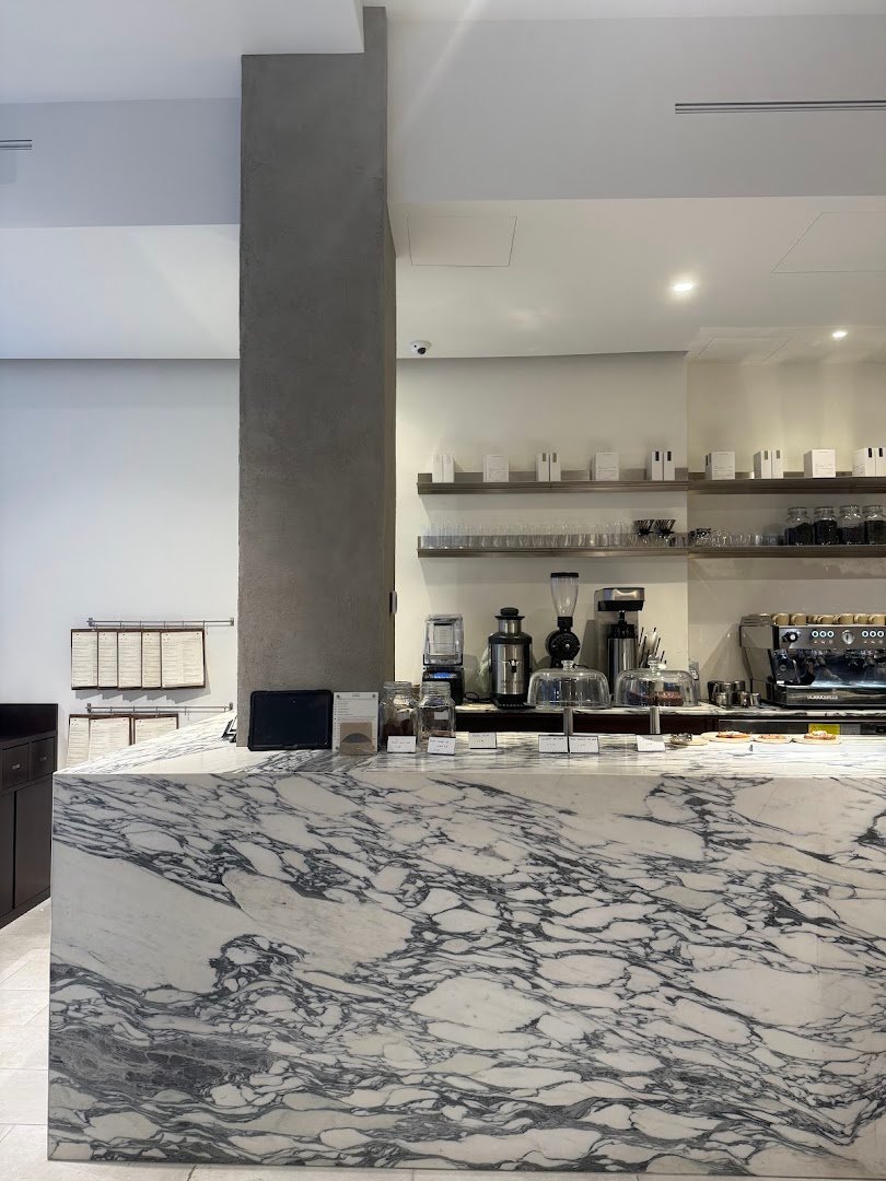 Interior of Atelier Prato, specialty coffee shop in Milan