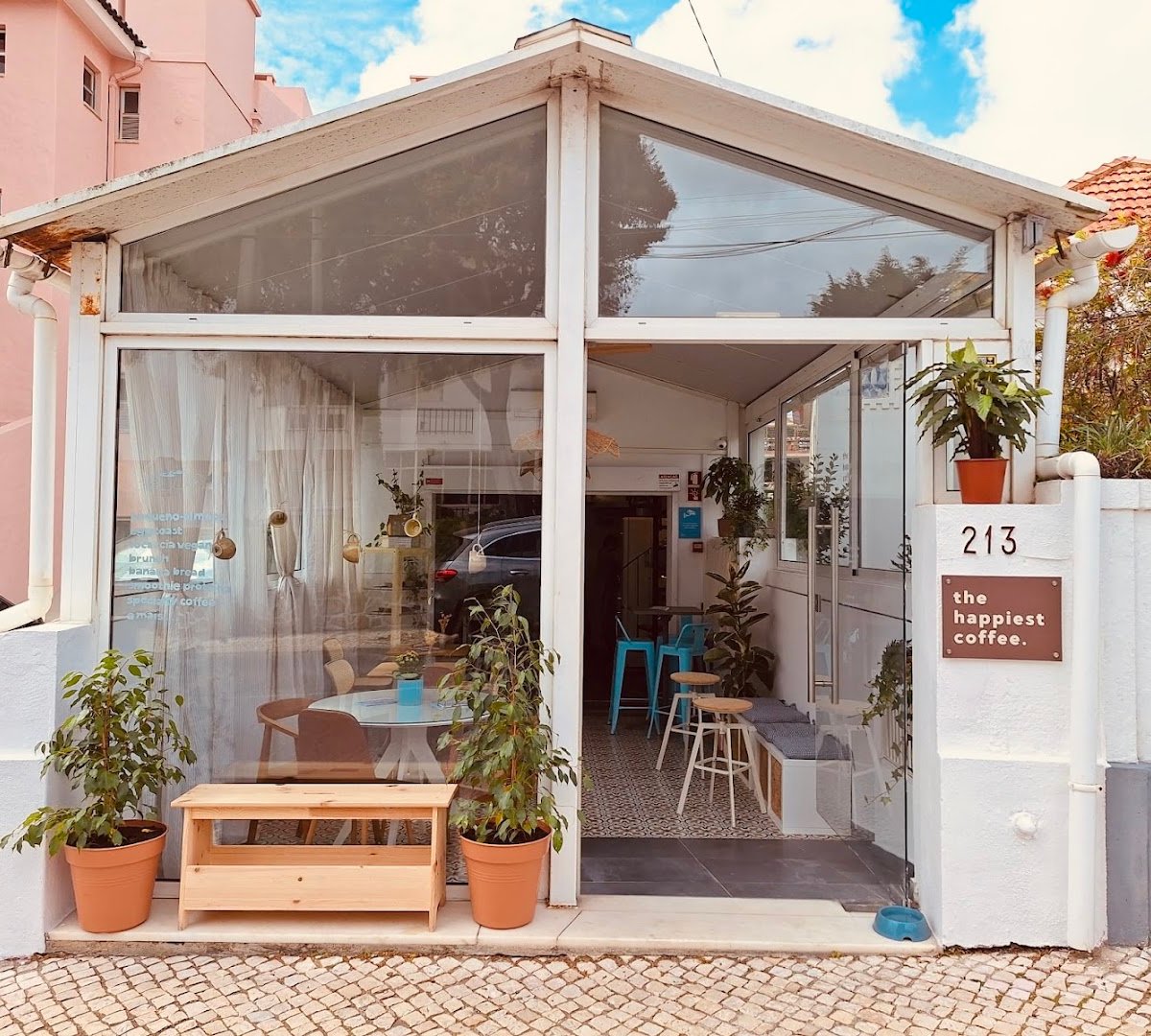 Storefront of The Happiest Coffee - Specialty Coffee - PAREDE, specialty coffee shop in Lisbon