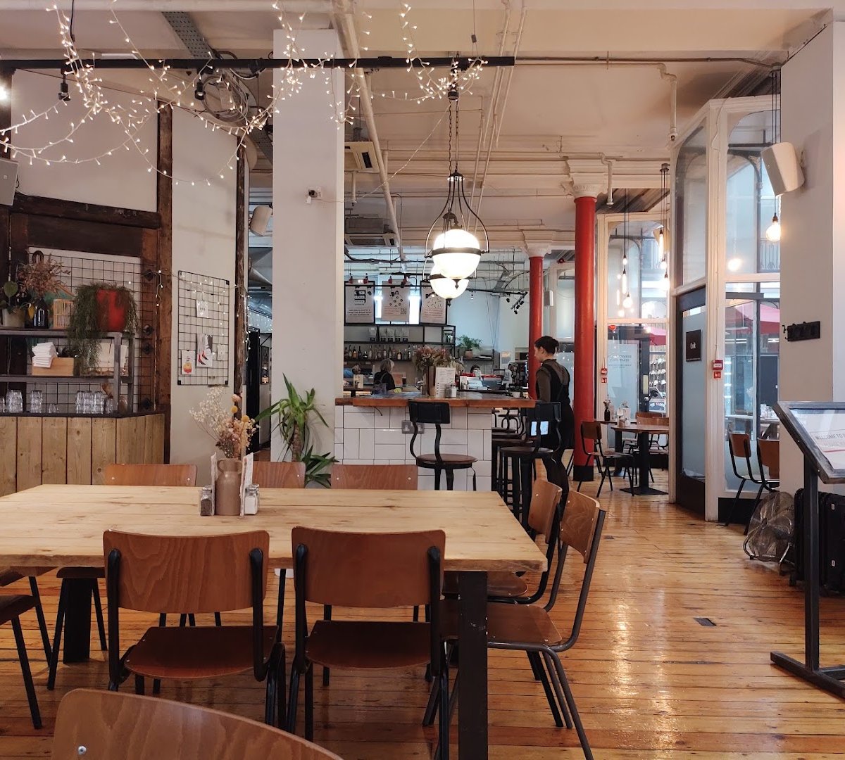 Interior of POT KETTLE BLACK Barton Arcade, specialty coffee shop in Manchester