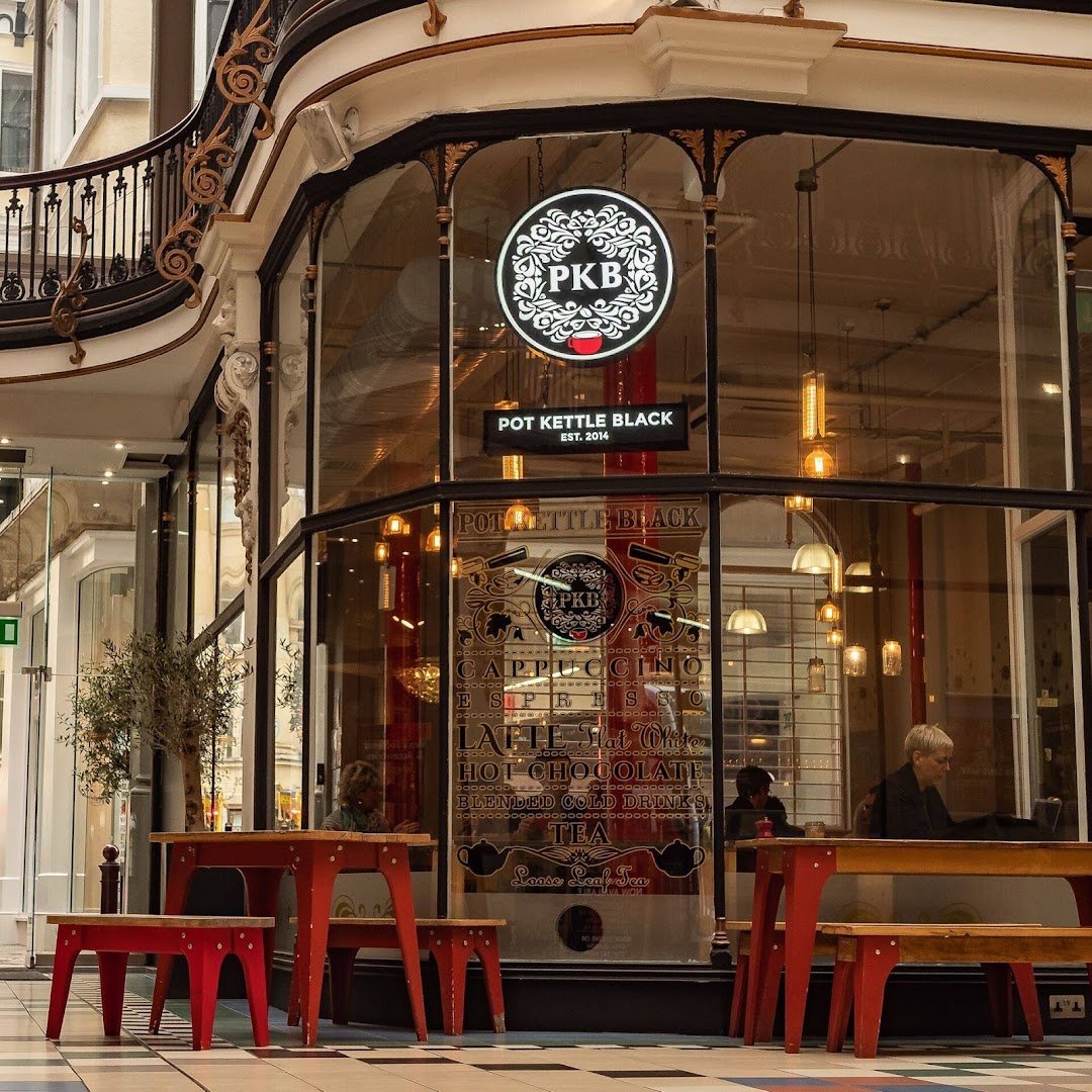 Storefront of POT KETTLE BLACK Barton Arcade, specialty coffee shop in Manchester