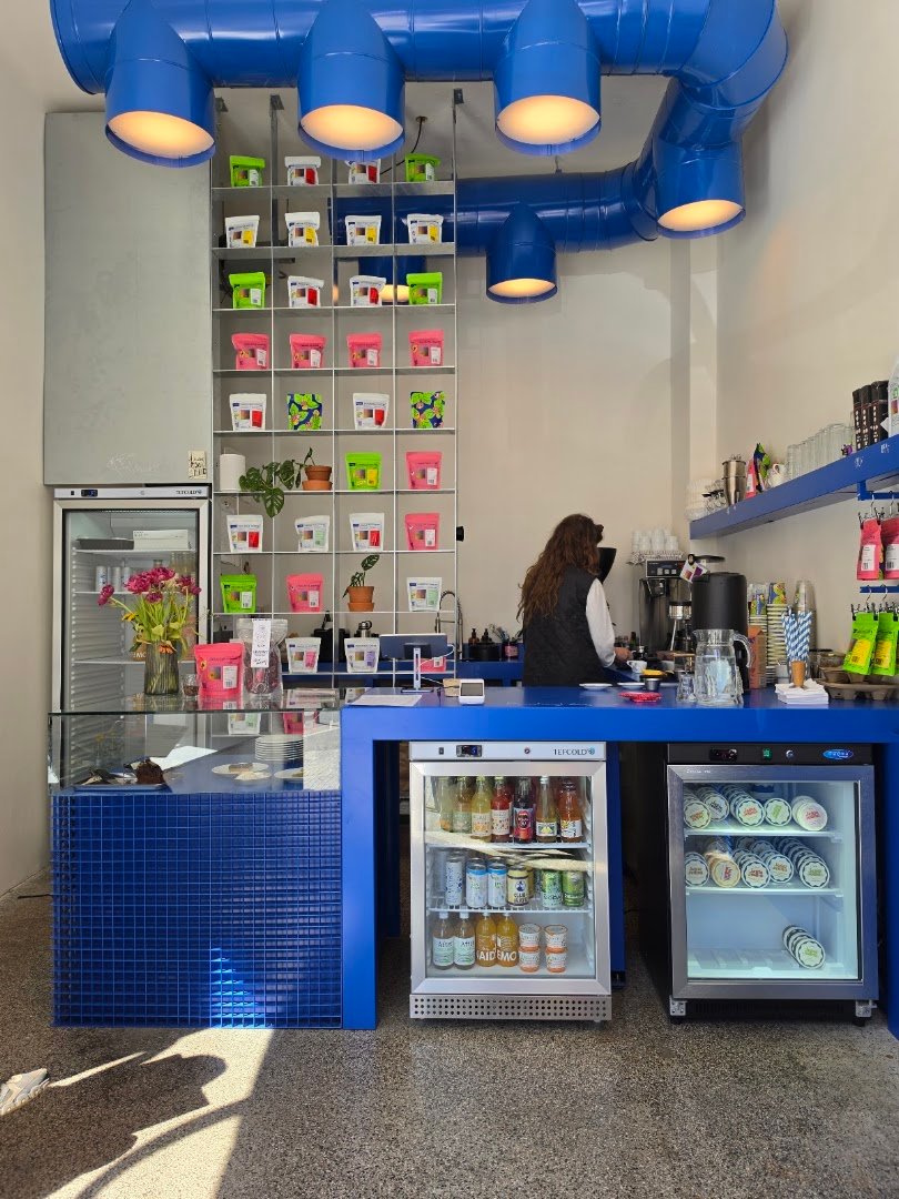 Interior of Industra Coffee Praha Holešovice, specialty coffee shop in Prague