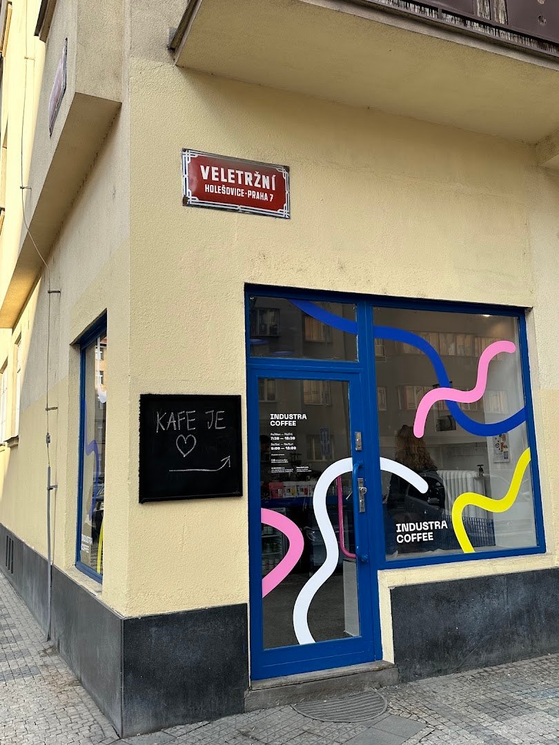 Storefront of Industra Coffee Praha Holešovice, specialty coffee shop in Prague