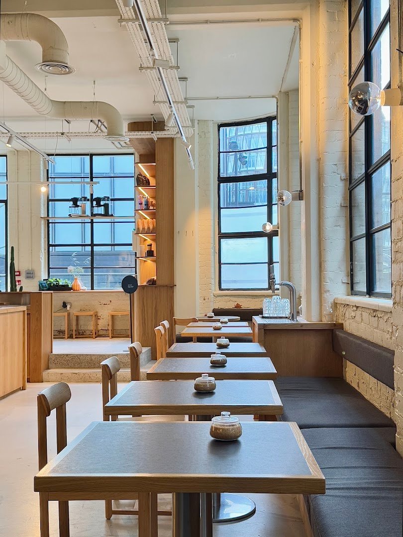 Interior of Allpress Coffee Roasters Manchester, specialty coffee shop in Manchester