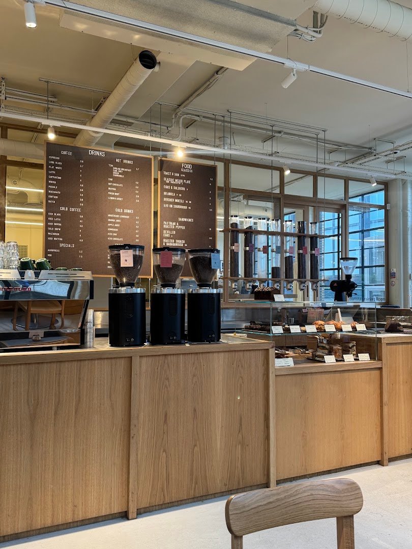 Interior of Allpress Coffee Roasters Manchester, specialty coffee shop in Manchester