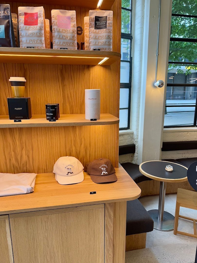 Interior of Allpress Coffee Roasters Manchester, specialty coffee shop in Manchester