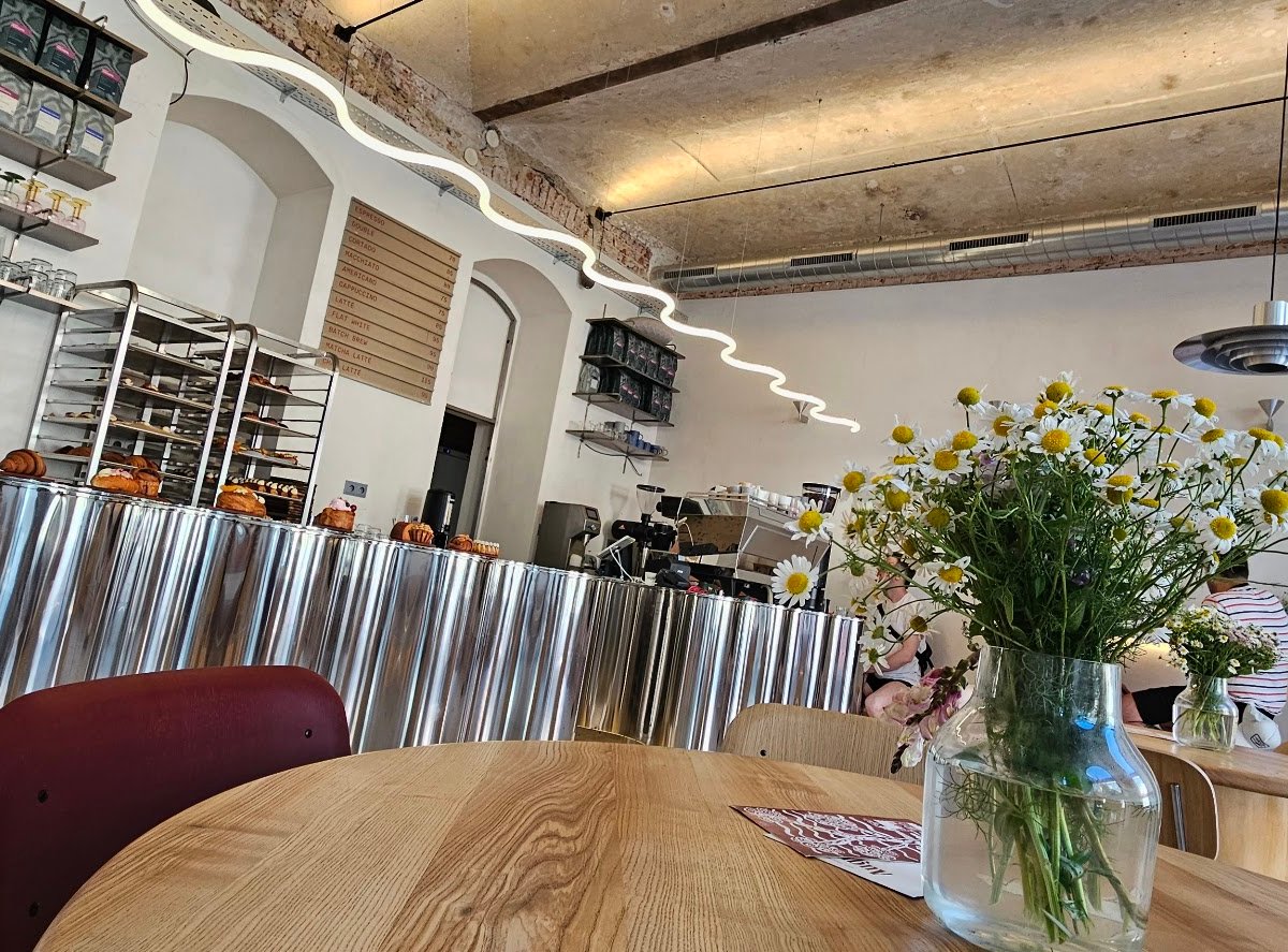Interior of AUGUST, specialty coffee shop in Prague