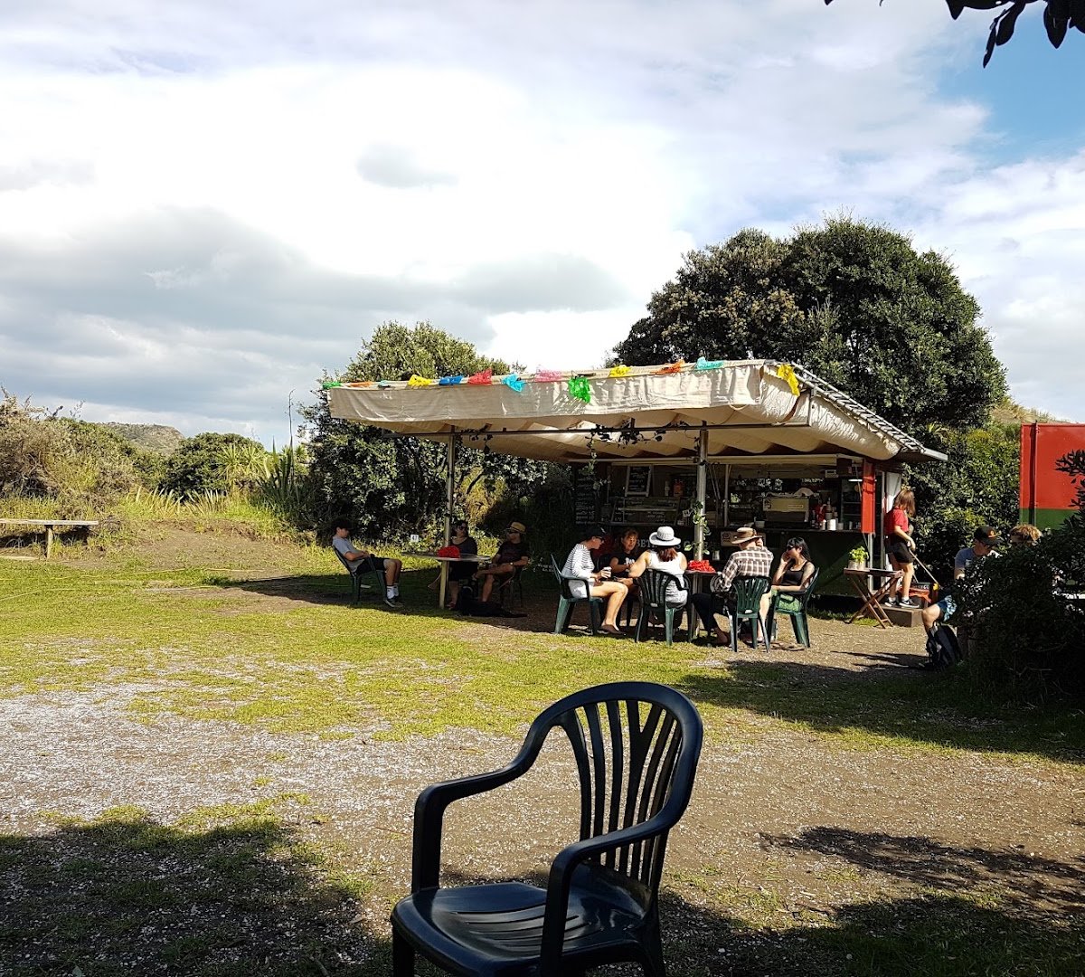 Storefront of Bethells Beach Cafe, specialty coffee shop in Auckland