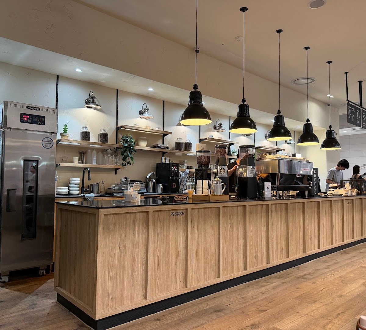 Interior of 마일스톤 커피 더현대 서울, specialty coffee shop in Seoul